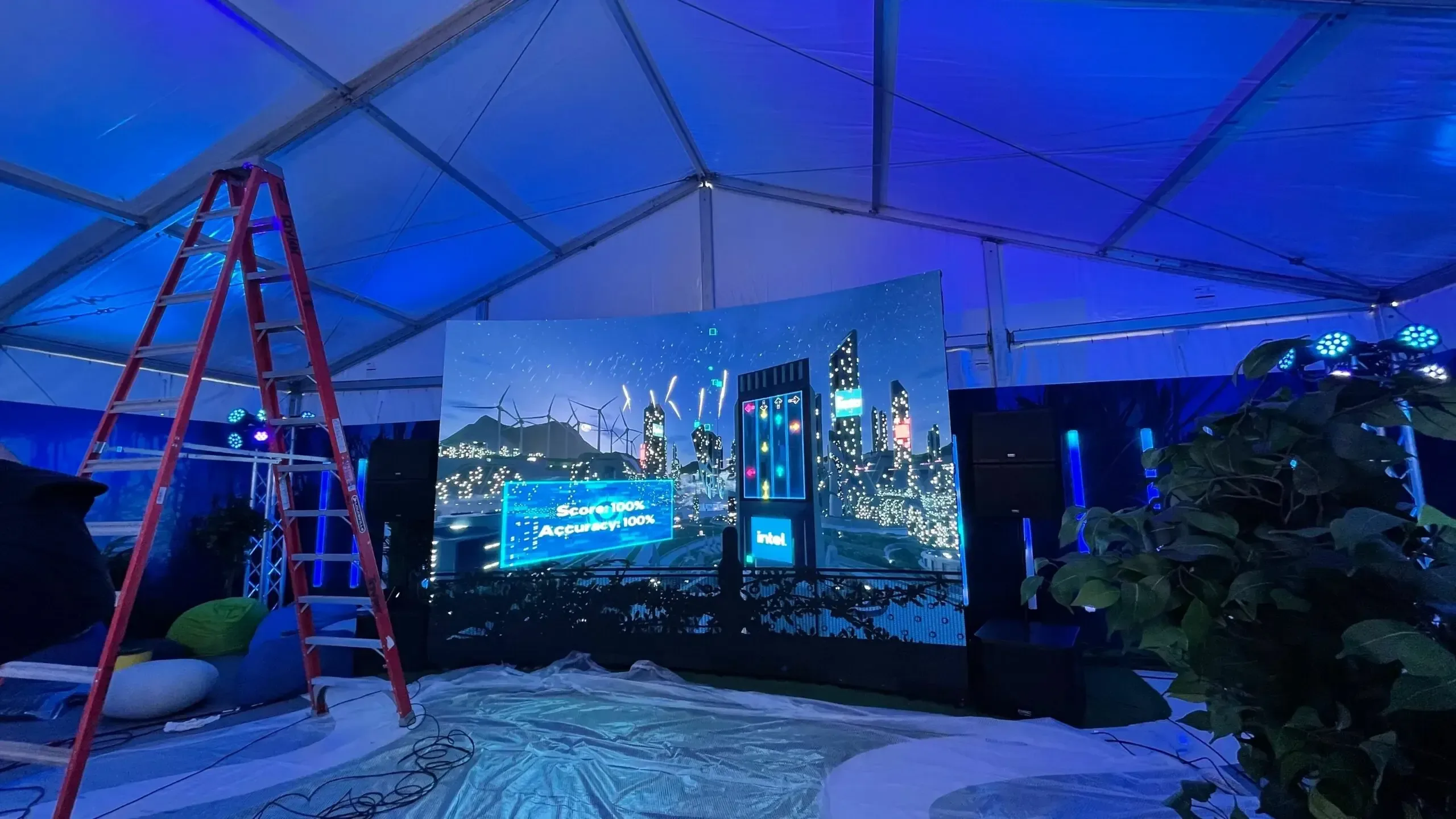 A large screen with a cityscape on it.